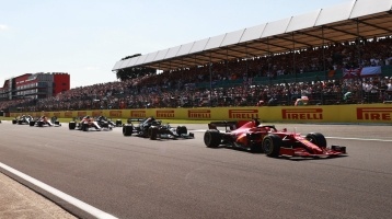 Formula 1 cars lined up at the British Grand Prix
