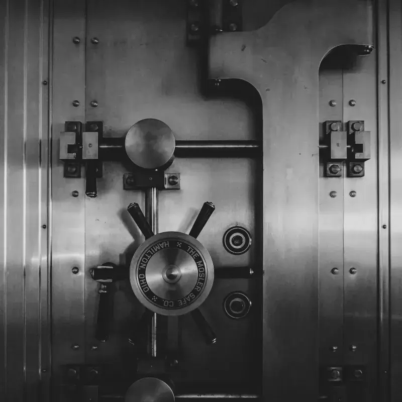 Bank vault door locks and mechanisms